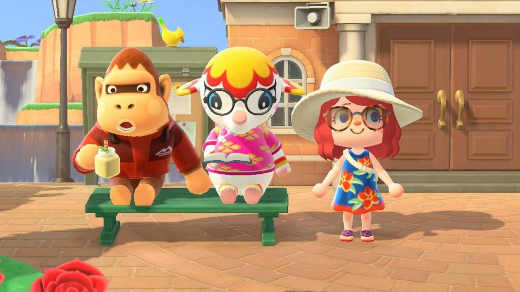 Animal Crossing screenshot with three characters sitting on a green bench outside a building