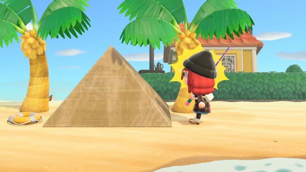 Animal Crossing desert scene with character in red outfit and black hat standing before palm trees and Egyptian pyramid