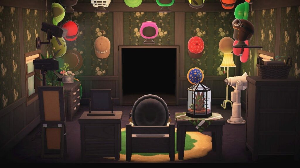 Game room with dark wooden walls, hanging colorful lanterns in red, pink, green and yellow, and various furniture pieces