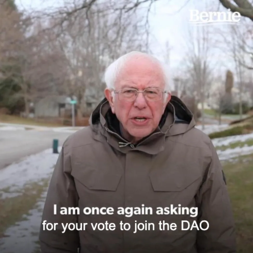 Screenshot: Bernie Sanders meme with text "I am once again asking for your vote to join the DAO"