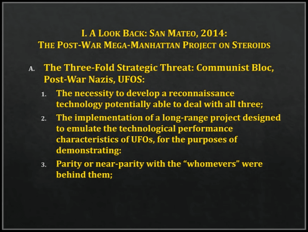Presentation slide titled "LA Look Back: San Mateo, 2014: The Post-War Mega-Manhattan Project on Steroids" with yellow text on dark background listing strategic threats
