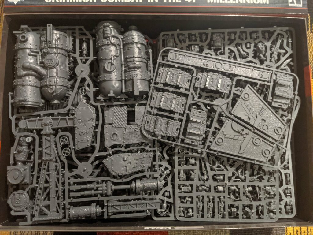 Warhammer 40K plastic model sprues with miniature components ready for assembly
