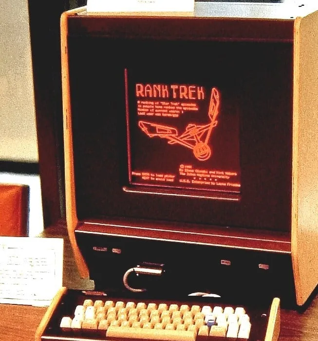 Featured image for PLATO Computer System: PLATO Learning - A vintage terminal displaying the Rank Trek game on an orange plasma screen.