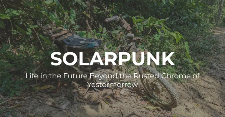 Featured image for Solarpunk: Life in the Future Beyond the Rusted Chrome of Yestermorrow - a rusted, skeletal motorbike abandoned in dense green foliage.