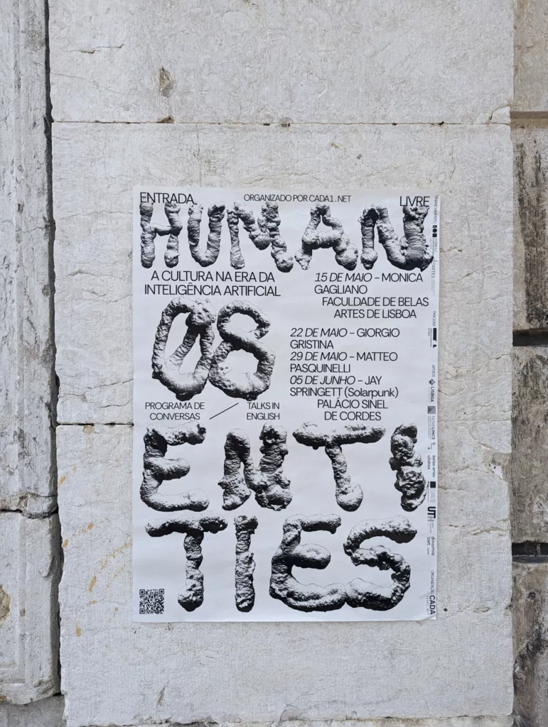 A poster for Human Entities 08 featuring bulbous, rocky-textured lettering pasted onto a weathered, light stone wall.