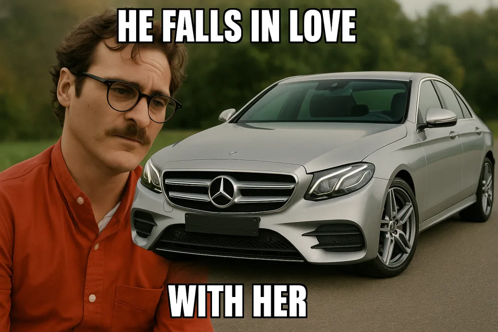 Featured image for Her Car - Joaquin Phoenix from the film Her looking at a silver Mercedes-Benz with the text HE FALLS IN LOVE WITH HER.