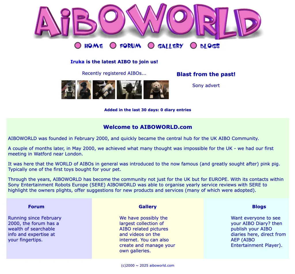 A screenshot of the AIBOWORLD website, a community hub for Sony AIBO robot owners. The page features a stylized pink logo and navigation for Home, Forum, Gallery, and Blogs. The text welcomes users to the site, noting it was founded in February 2000 for the UK and European AIBO community. Sections describe the forum's history, the image gallery, and member blogs. Small thumbnails show "Recently registered AIBOs" including various models of the robot dogs.